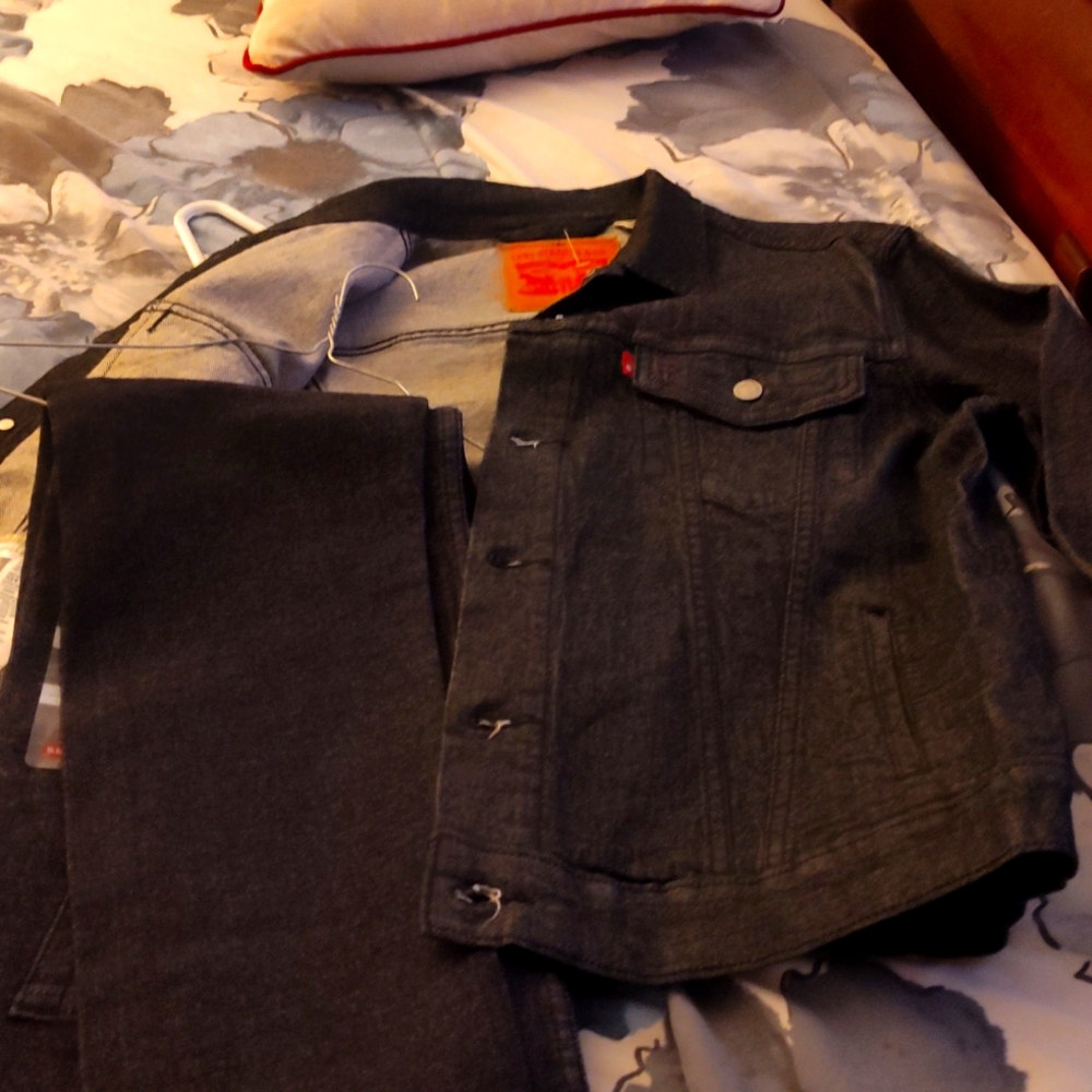 Faded black Levi's jean jacket and matching jeans set
